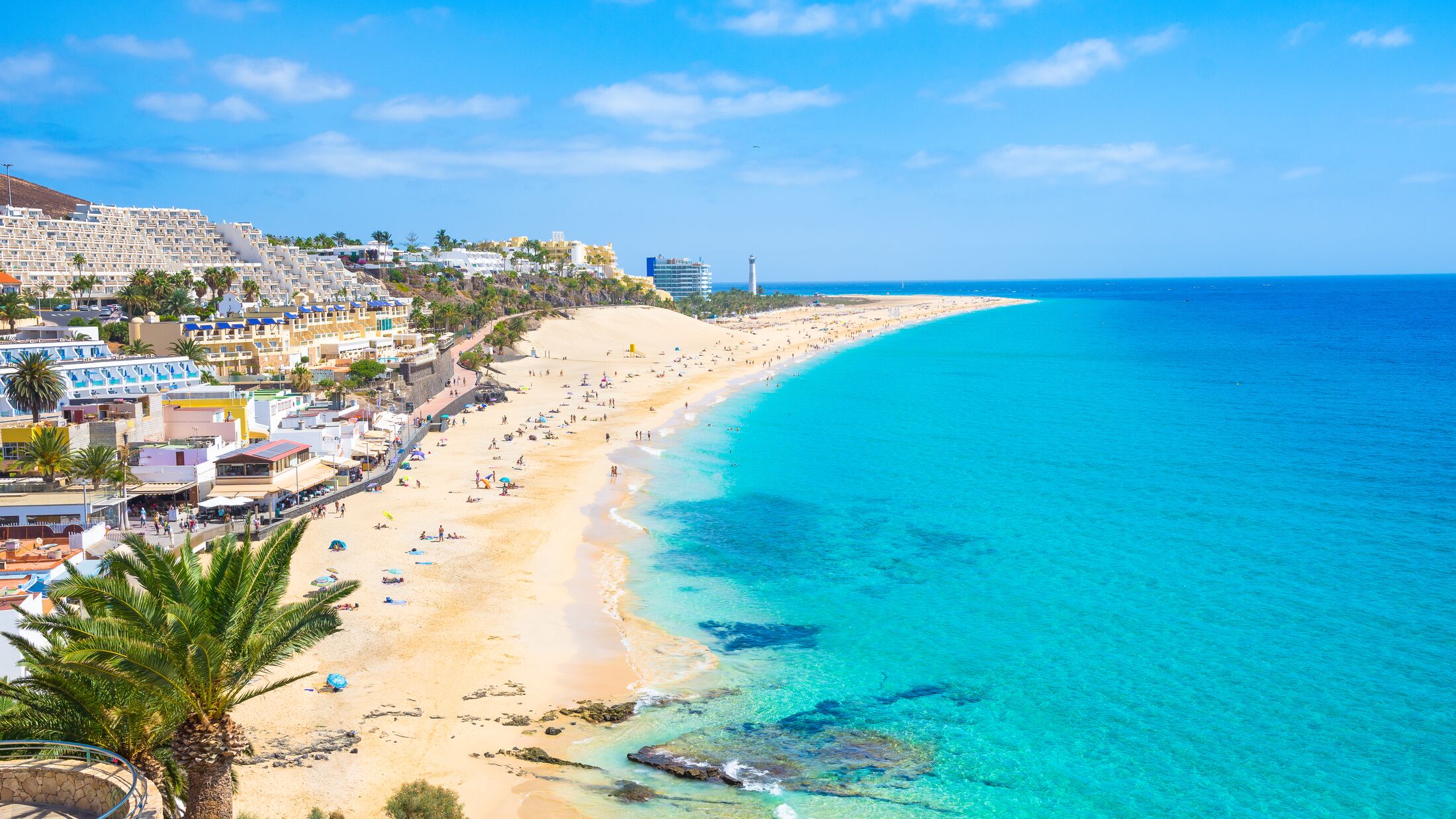 Fuerteventura is known for its Caribbean-style turquoise lagoon beaches Turquoise lagoon beach in Fuerteventura with shallow clear water