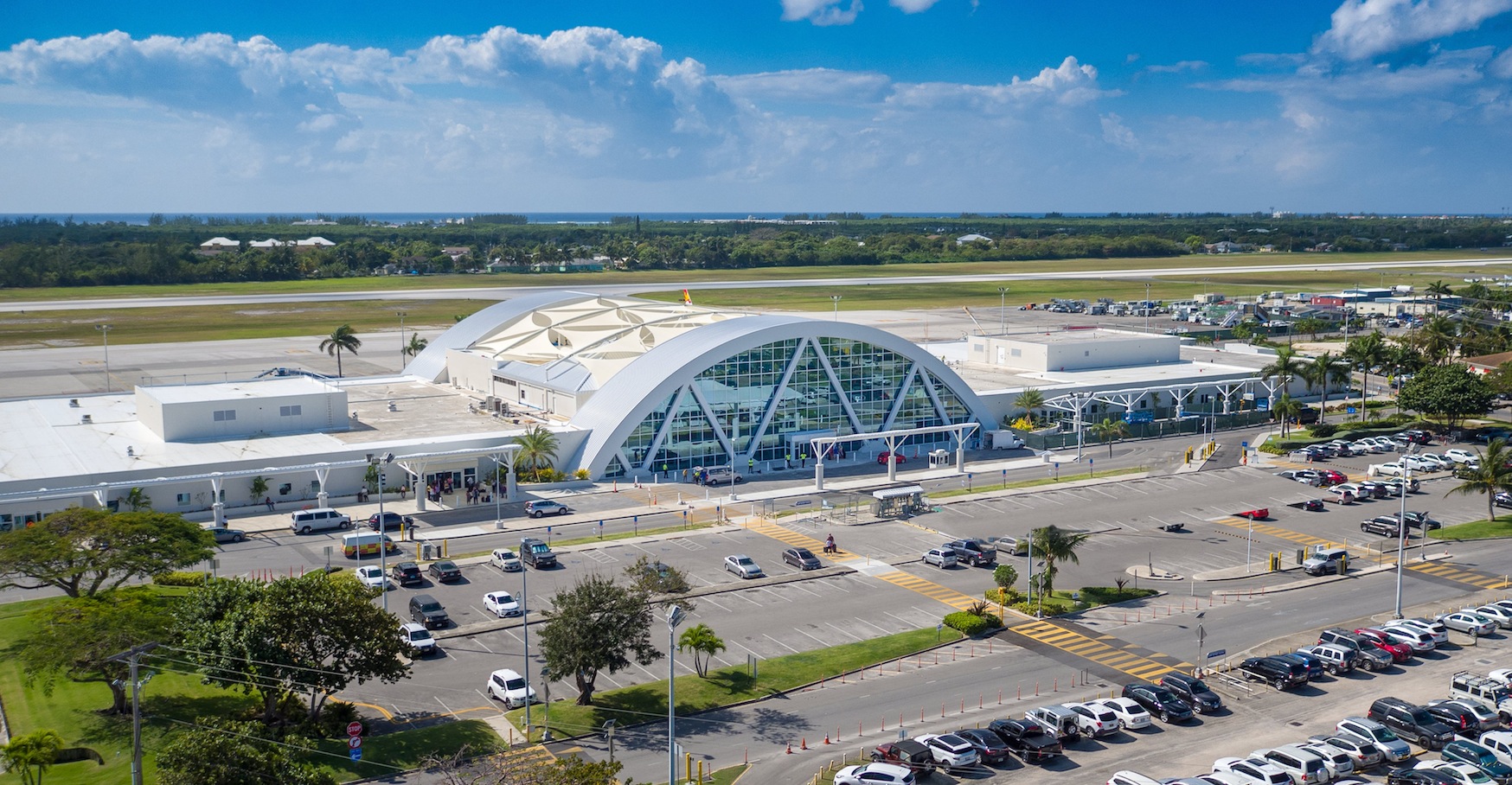 Cayman Islands Airport – Owen Roberts International Airport Guide Owen Roberts International Airport exterior view with aircraft on the apron in Grand Cayman