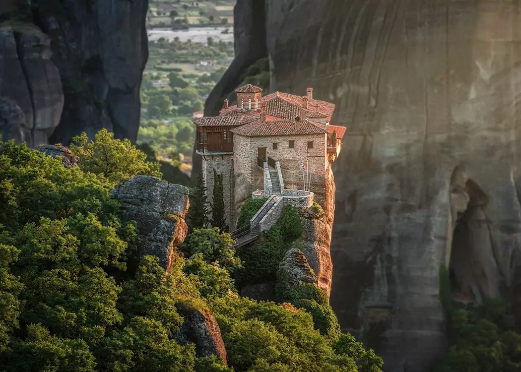 Meteora Monasteries – One of the Most Iconic Things to Do in Greece Meteora Monastery perched on dramatic rock formations, one of the top things to do in Greece