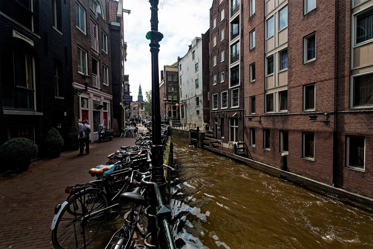 The Oude Kerk tower above the surrounding canal streets. The Oude Kerk tower above the surrounding canal streets.