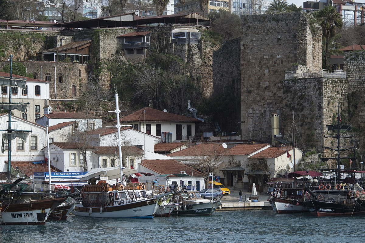 Boats moored beneath the stone walls of Antalya’s old harbour Boats moored beneath the stone walls of Antalya’s old harbour