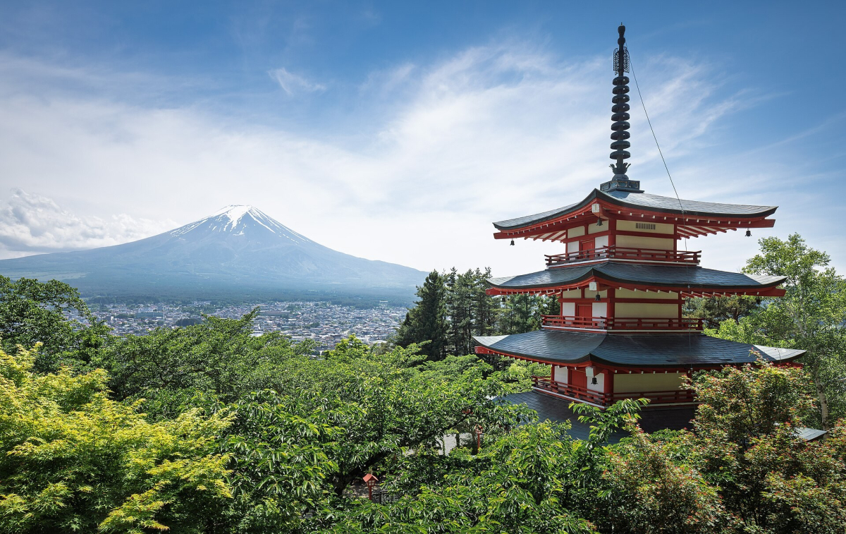 Chureito Pagoda and Mount Fuji above green trees in Fujiyoshida, Japan Chureito Pagoda and Mount Fuji above green trees in Fujiyoshida, Japan