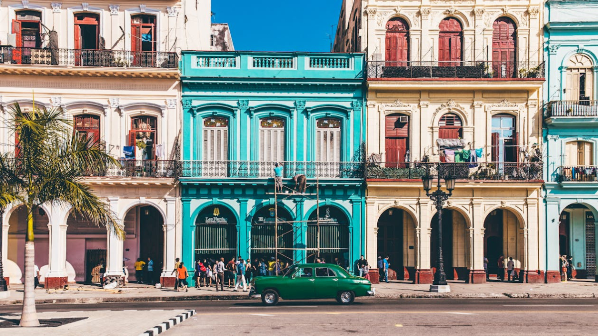 Classic Cars in Old Havana, Cuba Colorful classic cars driving through Old Havana
