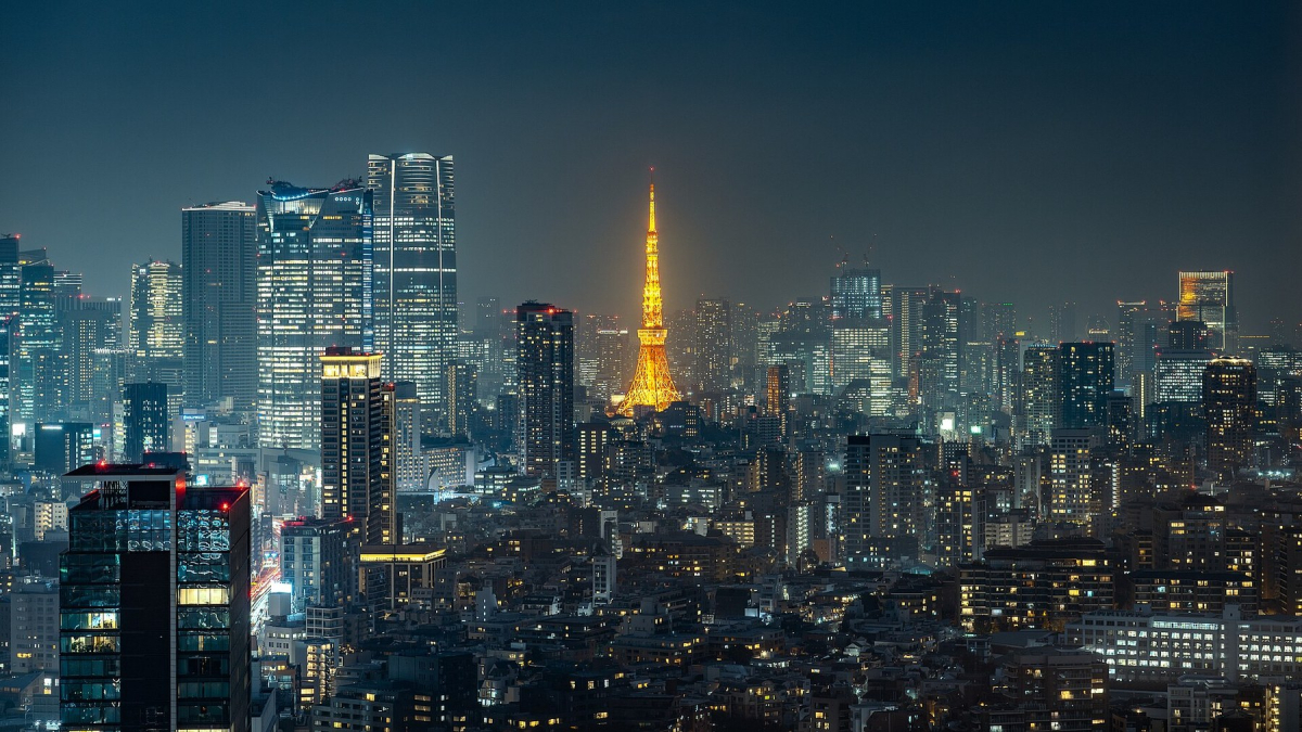 Tokyo Tower and the surrounding skyline after dark Tokyo Tower and the surrounding skyline after dark