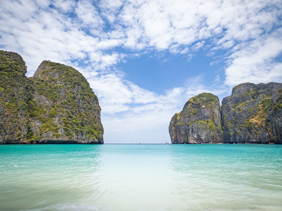 Maya Bay beach and limestone cliffs on Ko Phi Phi Leh in Thailand