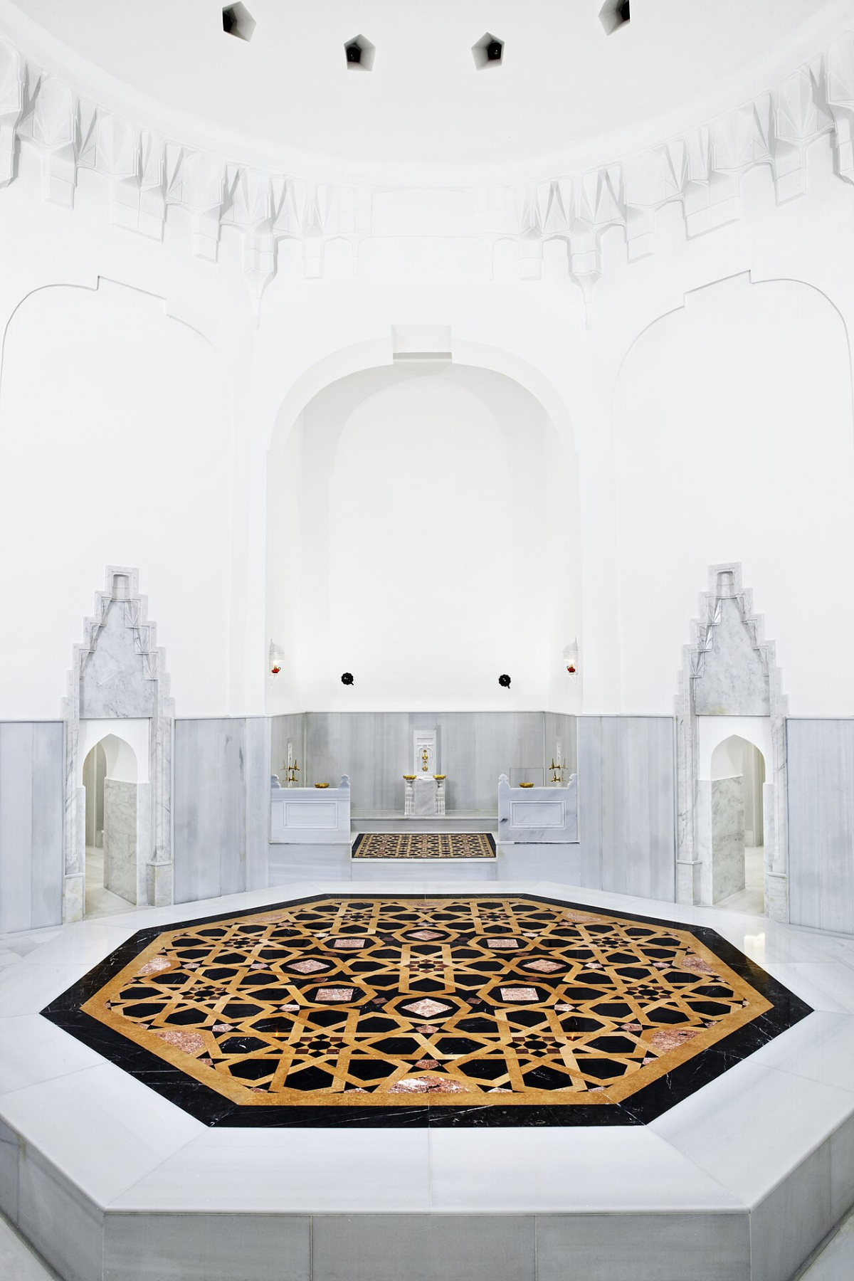 White marble interior and patterned central platform inside Hürrem Sultan Hamam