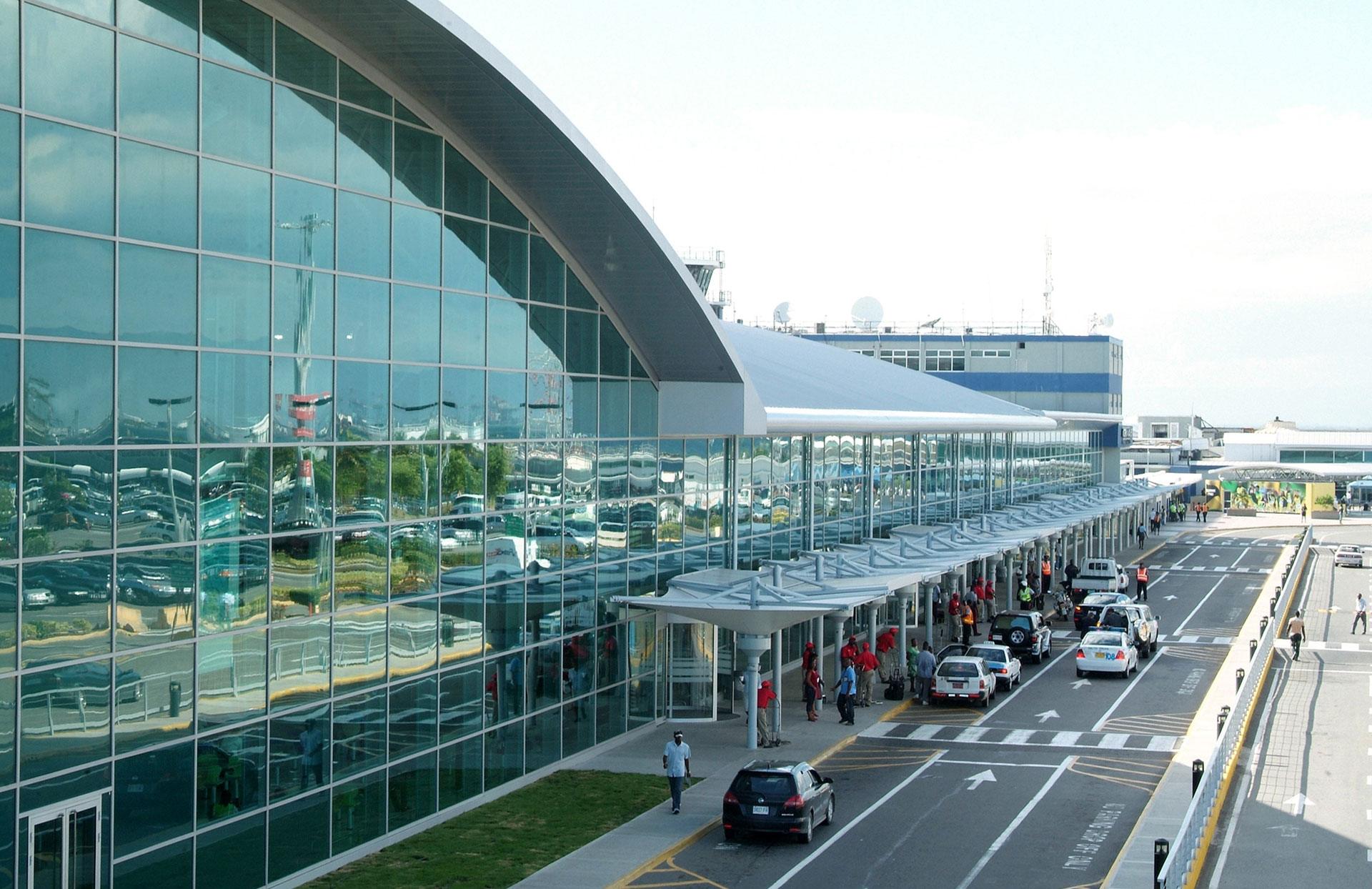 Jamaica Airports – Which Airport to Choose for Kingston, Montego Bay & Ocho Rios Exterior view of Norman Manley International Airport in Kingston, Jamaica